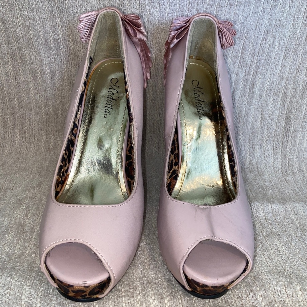 pink heels with a Bow on the back